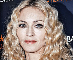 Ради молодого возлюбленного Мадонна сделала семь пластических операций 