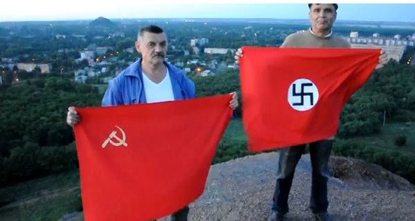 В Донецке шахтеры-пенсионеры на вершине террикона спалили советский и гитлеровский флаги 