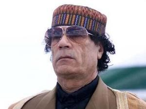 Противники Каддафи заявили, что установили где он прячется и окружили это место