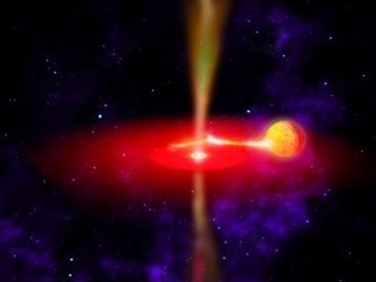 Ученые нашли самую маленькую и прожорливую черную дыру