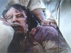 Кольцо и окровавленная рубашка Каддафи выставлены на аукцион за 2 миллиона