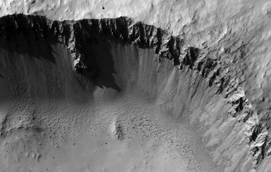 Камера на борту разведывательного спутника сделала невероятный снимок марсианского кратера в 3D