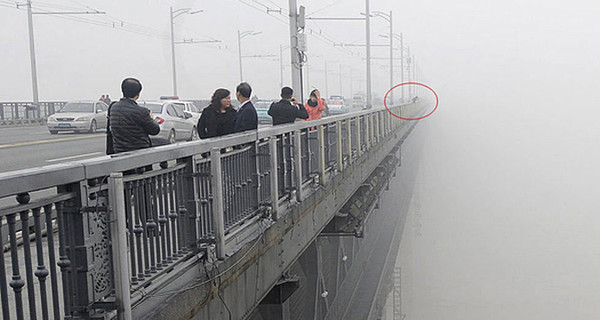 Китайский фотограф случайно сфотографировал двойное самоубийство