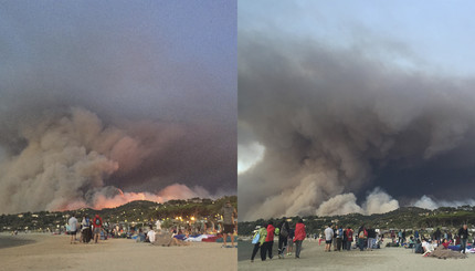 Эвакуированные люди на пляже