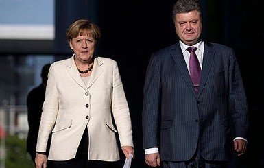 Меркель встретится с Порошенко и Яценюком