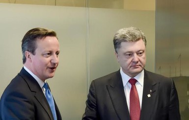 Порошенко после бессонной ночи в Минске встретился с премьером Британии в Брюсселе