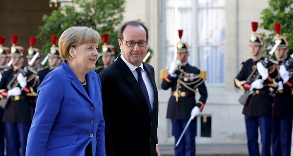 Президенты в Париже говорят о выборах, амнистии и особом статусе Донбасса