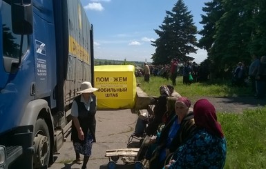 Помощь жителям 400 поселков и сел Донбасса. Год работы 