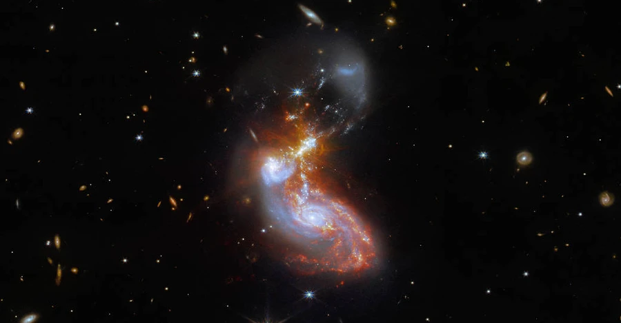 Макрон и Харрис первыми увидели уникальное фото слияния двух галактик