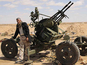 Каддафи обрушил на повстанцев залповый огонь артиллерии