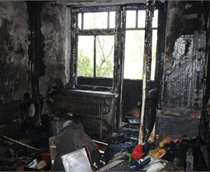 В Днепропетровске соседи спасли из огня трех малышей