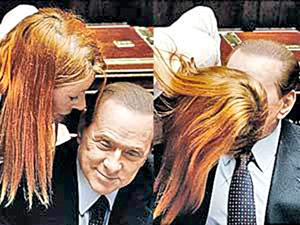Сильвио Берлускони опять засветился перед камерами в обществе красивой дамы