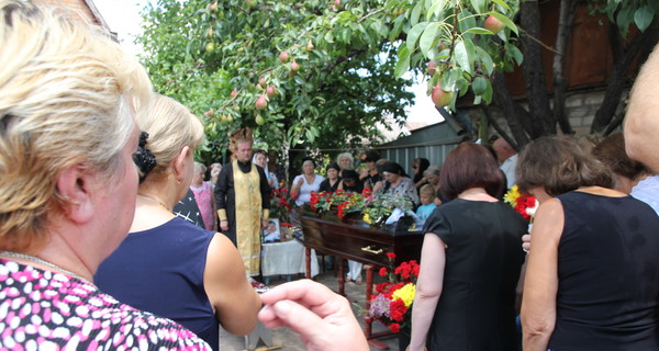 Убитых инкассаторов хоронили в закрытых гробах