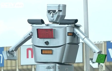 В Конго светофоры заменили человекоподобными роботами