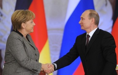 Путин и Меркель целый час решали проблемы Украины
