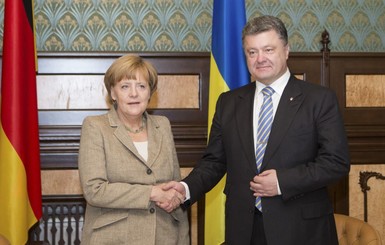 Порошенко поговорил с Меркель накануне переговоров в Минске