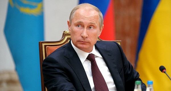 Путин заявил, что договорился с Порошенко о передаче десантников