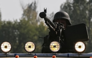 СНБО: Украина отведет войска синхронно с противником