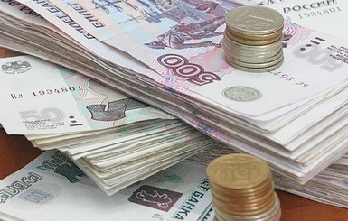 Эксперт: российскую валюту ждет контролируемая девальвация до 50 руб/доллар