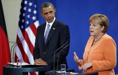 Обама и Меркель по телефону договорились призвать Россию к ответу
