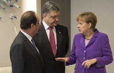 Порошенко, Олланд и Меркель обсуждают украинский кризис за закрытыми дверями