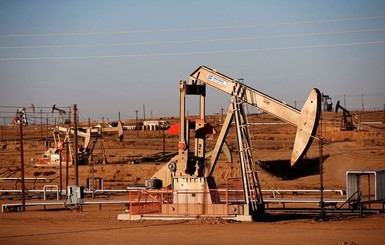Нефть и доллар снова дешевеют