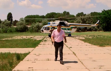 Один день из жизни губернатора: Саакашвили проехался в автобусе, полетал на вертолете и поплавал на катере