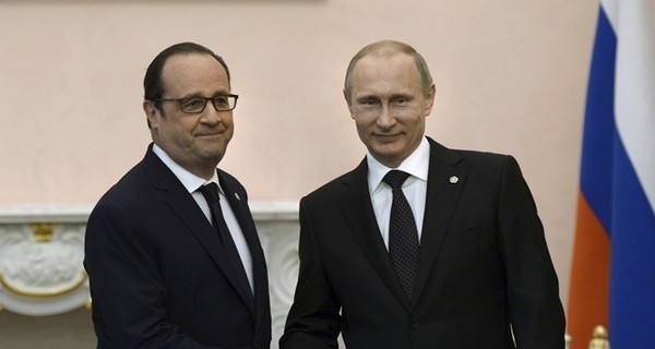 После встречи в Берлине Олланд пригласил Путина в Париж