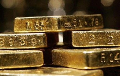 Стоимость золота упала до месячного минимума