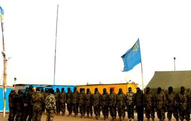 СМИ: В Чонгаре одетые в военную форму люди захватили базу крымскотатарсокого батальона 
