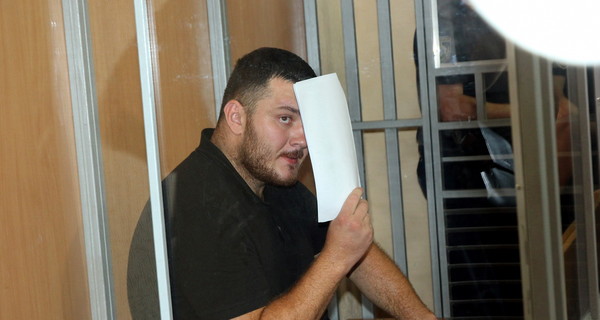 Подозреваемый в 