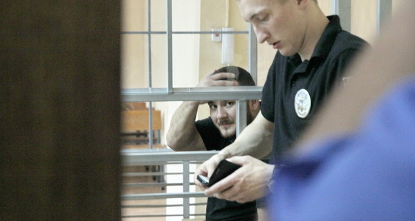 Подозреваемый в 