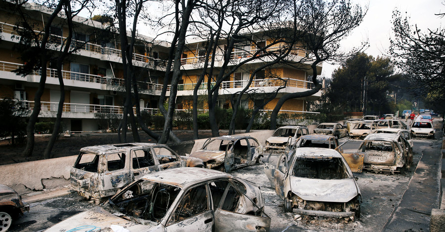 Под Афинами число погибших в пожарах достигло 60 человек, среди них много детей