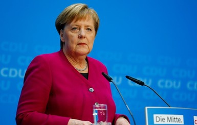 Меркель заранее поздравила Порошенко с выходом во второй тур