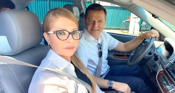 Юлию Тимошенко засняли вверх ногами в машине Олега Ляшко