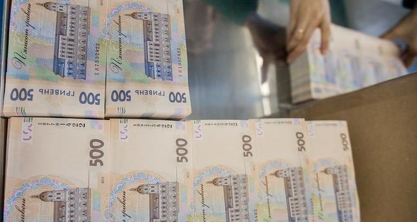500 килограммов долларов: зачем украинские чиновники хранят дома чемоданы денег
