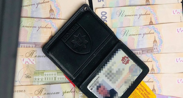 В Киеве задержали полицейского, который за взятку разрешал заведениям работать в карантин