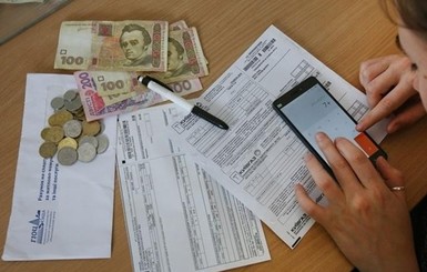 Банки будут автоматом списывать со счетов украинцев долги за коммуналку 