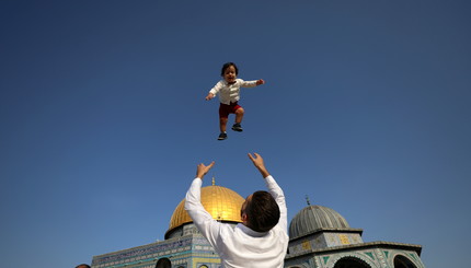 Палестинцы отмечают первый день мусульманского праздника Курбан-байрам в Старом городе Иерусалима