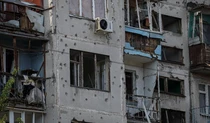 Обстрелянный жилой дом в Славянске