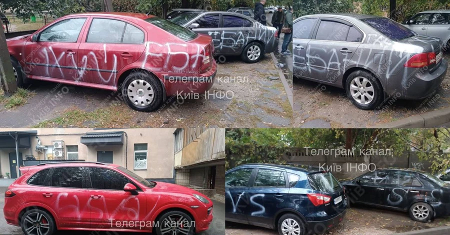 Вночі у Києві двоє чоловіків розписали автомобілі нецензурщиною та символами окупантів