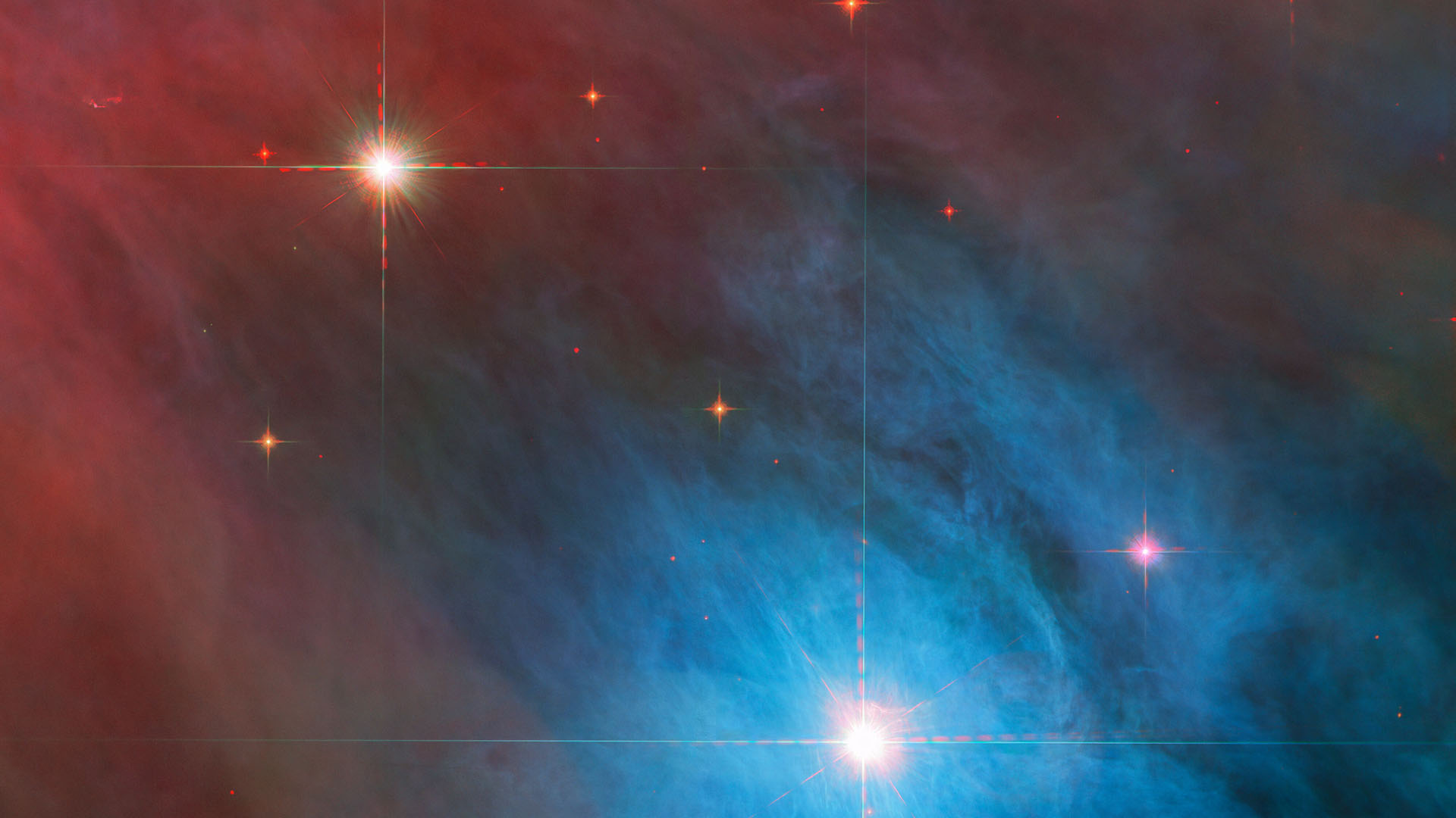Телескоп Hubble сфотографировал дуэт ярких молодых звезд в туманности Ориона фото 1