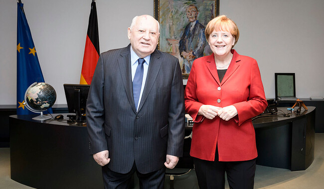 З канцлером Німеччини Ангелою Меркель, 2014 рік. Фото: Getty Images